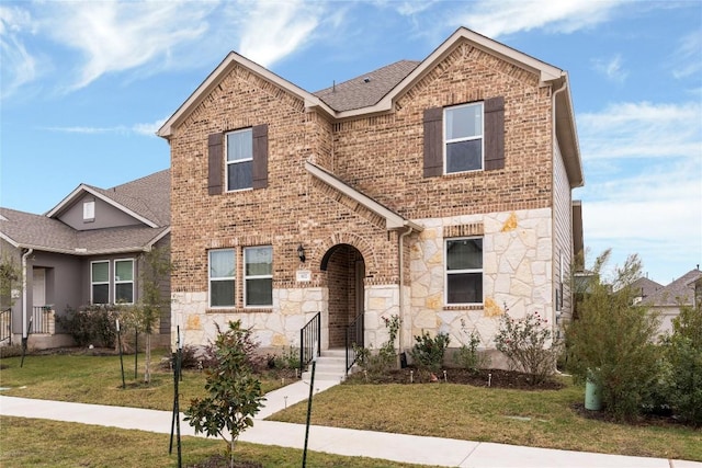 view of front facade with a front yard