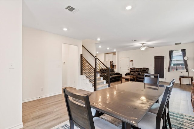 dining area featuring light hardwood / wood-style floors and ceiling fan