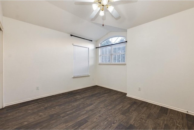 unfurnished room featuring ceiling fan, dark wood-type flooring, and vaulted ceiling