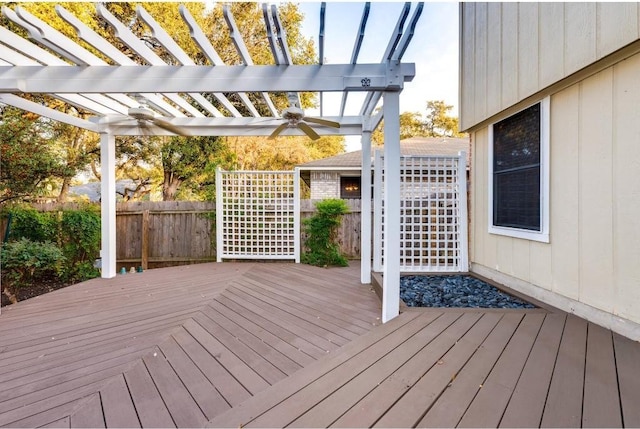 wooden deck with a pergola and ceiling fan