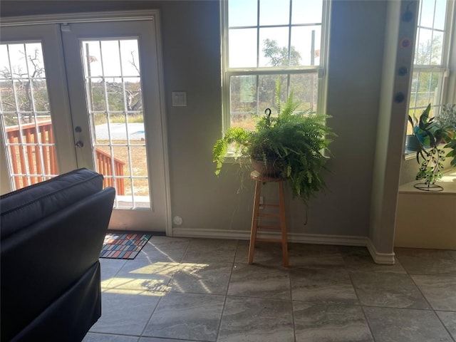 entryway featuring french doors