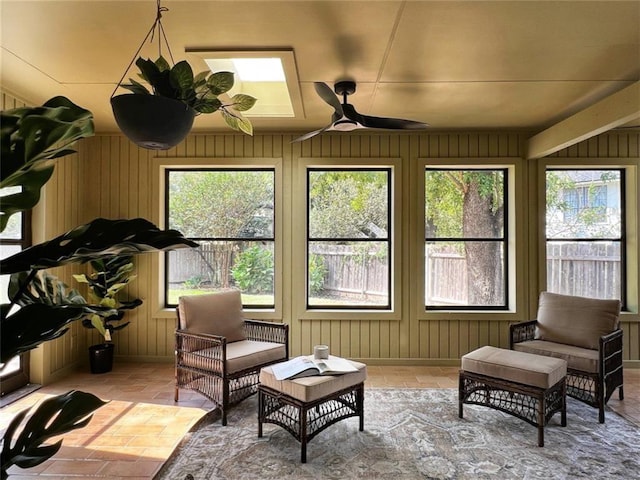 sunroom / solarium with ceiling fan