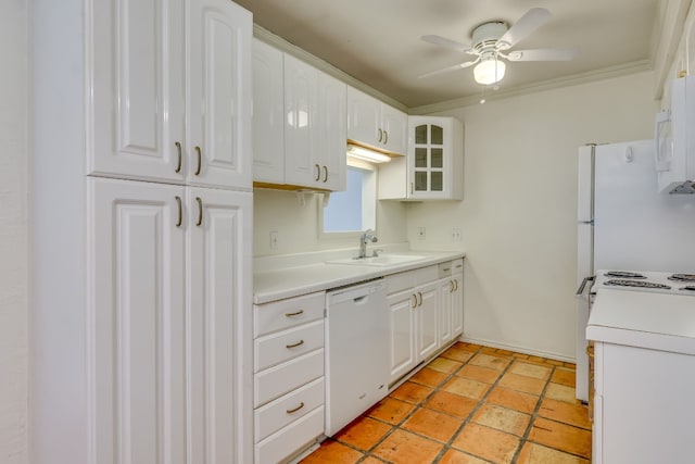 kitchen with white appliances, ceiling fan, crown molding, sink, and white cabinets