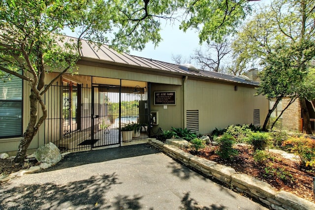 entrance to property with a carport