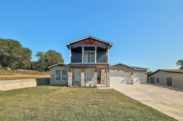 view of front facade featuring a front lawn and a garage