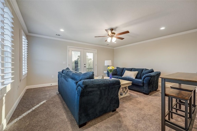 living room featuring visible vents, baseboards, french doors, carpet, and crown molding