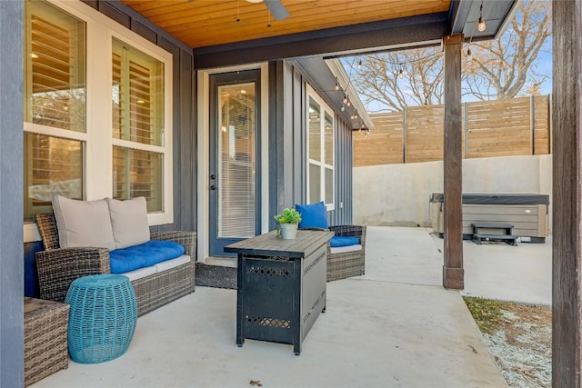 view of patio / terrace featuring fence