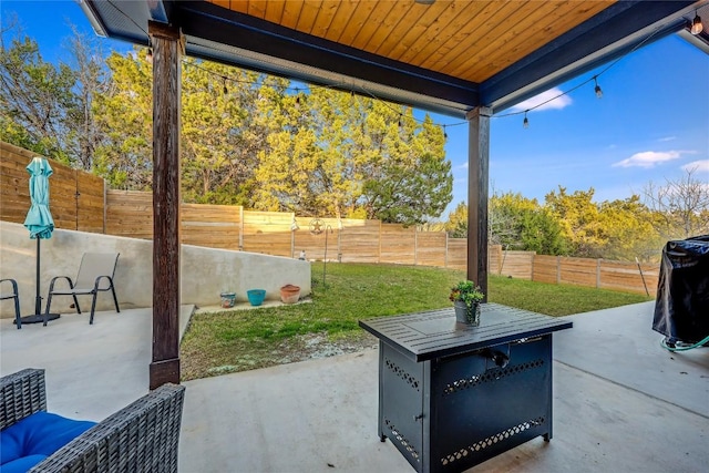 view of patio with a fenced backyard