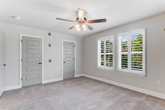20104 Byrd Ave, Lago Vista, TX 78645 - unfurnished room with ceiling fan, carpet floors, and a smoke detector