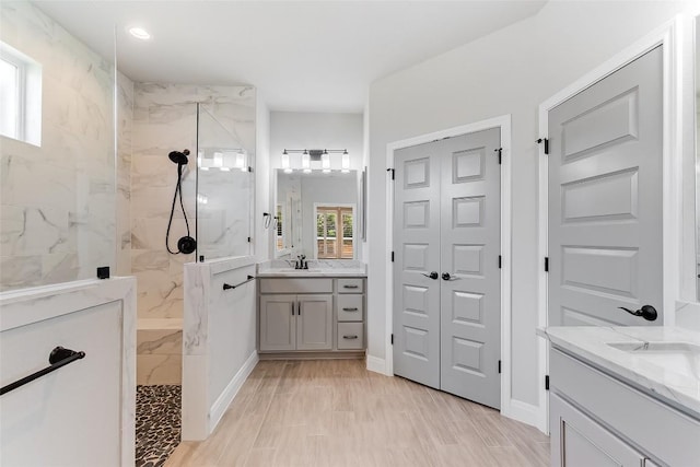 20104 Byrd Ave, Lago Vista, TX 78645 - full bath featuring a marble finish shower and two vanities