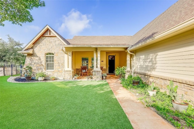 3500 Lohmans Ford Rd Unit 71, Lago Vista, TX 78645 - view of front of home featuring stone siding, covered porch, and a shingled roof