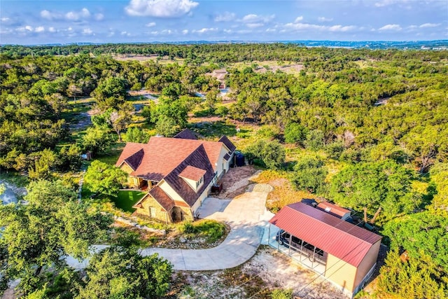 3500 Lohmans Ford Rd Unit 71, Lago Vista, TX 78645 - aerial view of property and surrounding area with a heavily wooded area