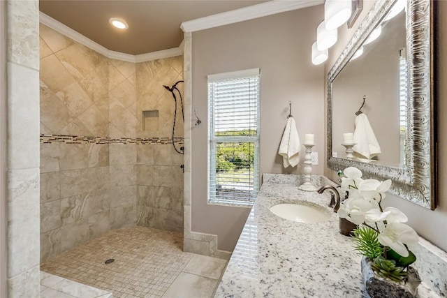 3500 Lohmans Ford Rd Unit 71, Lago Vista, TX 78645 - full bath with a tile shower, crown molding, vanity, tile patterned floors, and baseboards