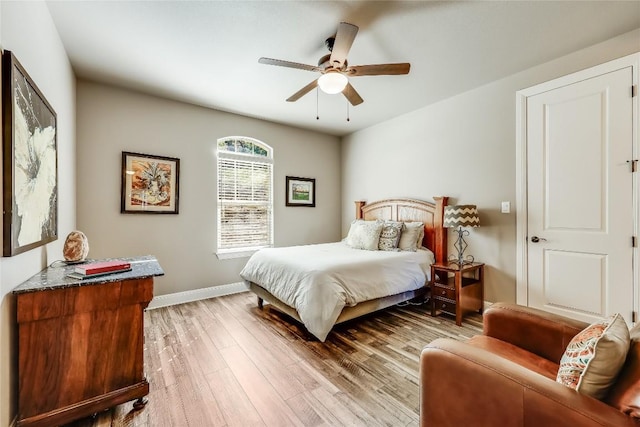3500 Lohmans Ford Rd Unit 71, Lago Vista, TX 78645 - bedroom with light wood-style flooring, baseboards, and ceiling fan