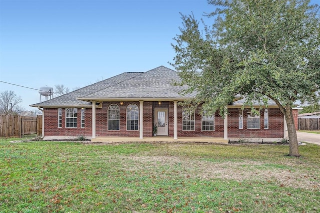 ranch-style house with a front yard