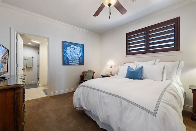 bedroom with ceiling fan, crown molding, and carpet floors