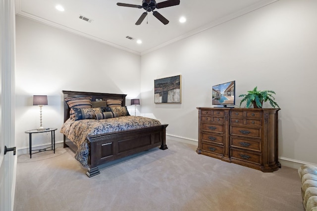 bedroom featuring ceiling fan, light colored carpet, and ornamental molding