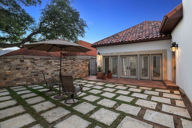 view of patio featuring french doors