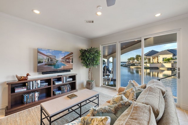 living room featuring crown molding