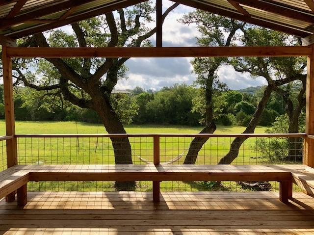 sunroom / solarium with vaulted ceiling