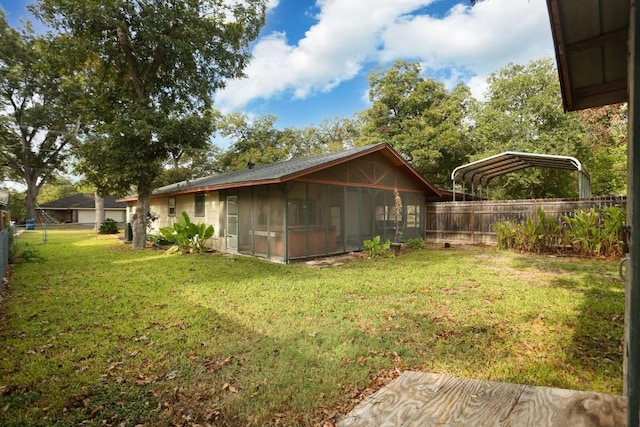 view of yard featuring a sunroom