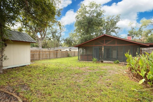 view of yard with a sunroom