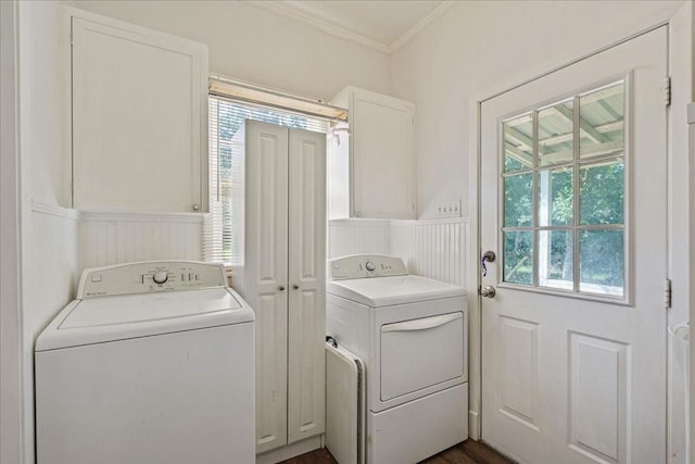 371 Youngs Prairie Rd, Elgin, TX 78621 - laundry room featuring cabinet space, ornamental molding, washer and dryer, a wainscoted wall, and a decorative wall