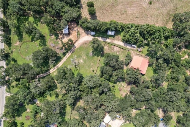 birds eye view of property with a rural view