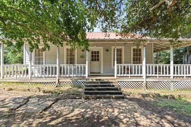 view of front of property featuring covered porch