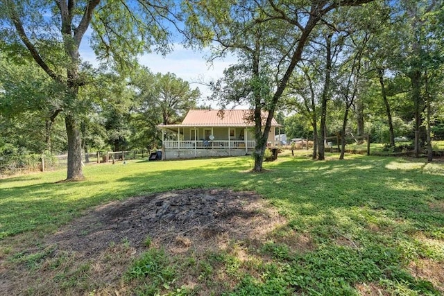 371 Youngs Prairie Rd, Elgin, TX 78621 - view of green lawn with a porch