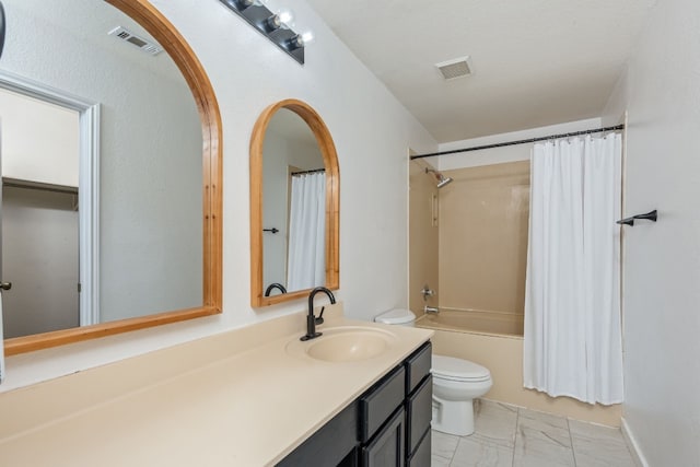 full bathroom featuring vanity, shower / tub combo, and toilet