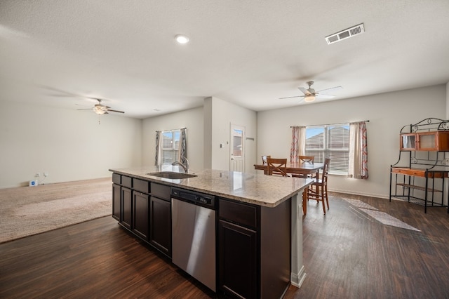 14405 Boomtown Way, Elgin, TX 78621 - kitchen with dishwasher, a ceiling fan, dark wood-style floors, and plenty of natural light