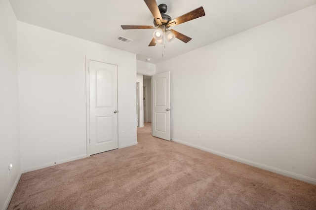 14405 Boomtown Way, Elgin, TX 78621 - unfurnished bedroom featuring light colored carpet and ceiling fan