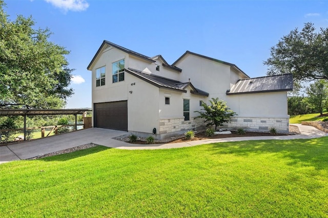 view of home's exterior featuring a garage and a yard