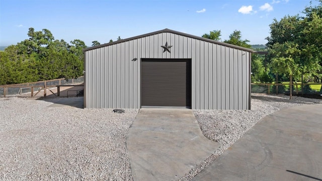 view of outbuilding with a garage