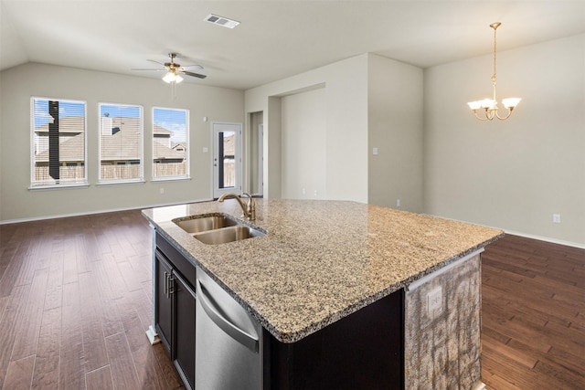 kitchen featuring dishwasher, sink, dark wood-type flooring, an island with sink, and pendant lighting