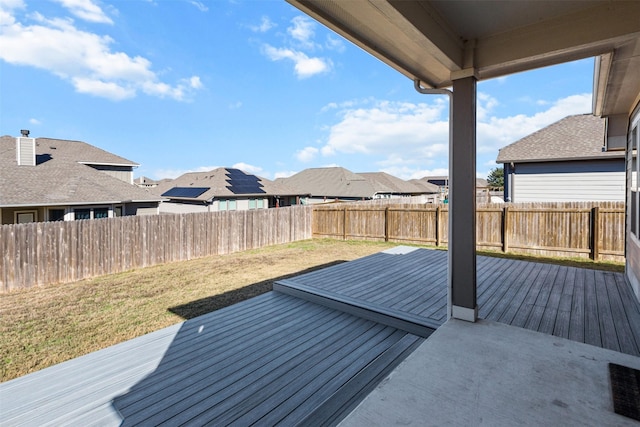 wooden deck with a yard