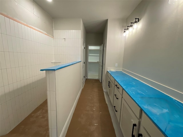 bathroom with concrete floors