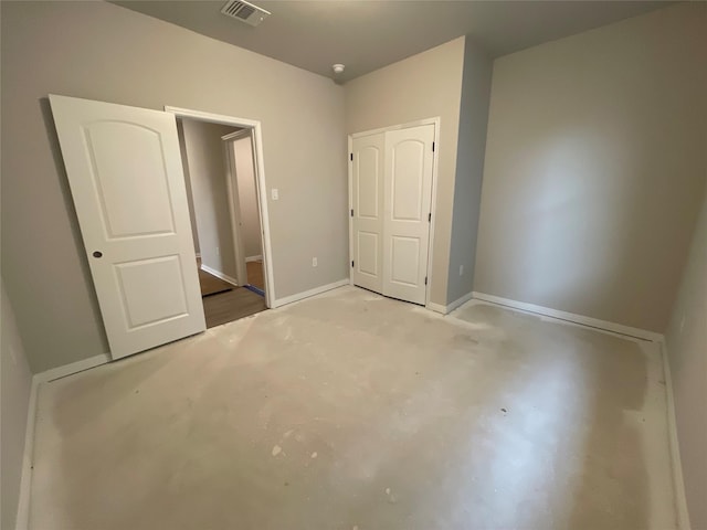 unfurnished bedroom with a closet