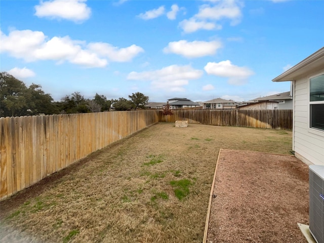 view of yard with central AC