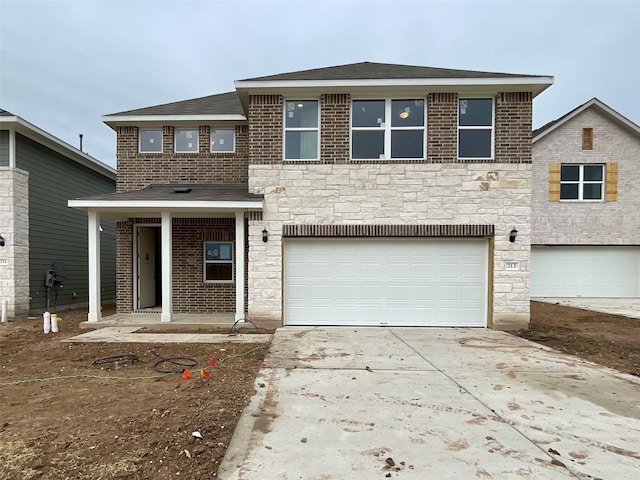 front of property with a garage