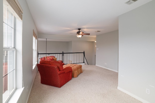857 Mission Hills Dr, New Braunfels, TX 78130 - living area with carpet flooring and a ceiling fan