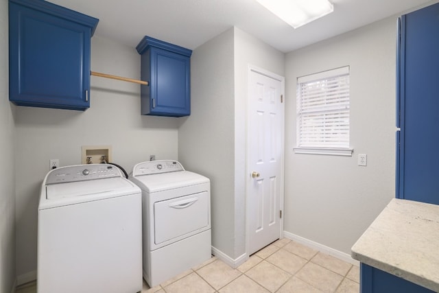 857 Mission Hills Dr, New Braunfels, TX 78130 - washroom with cabinet space, washer and clothes dryer, and light tile patterned flooring