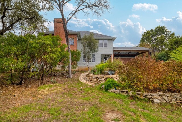 857 Mission Hills Dr, New Braunfels, TX 78130 - back of house featuring a chimney