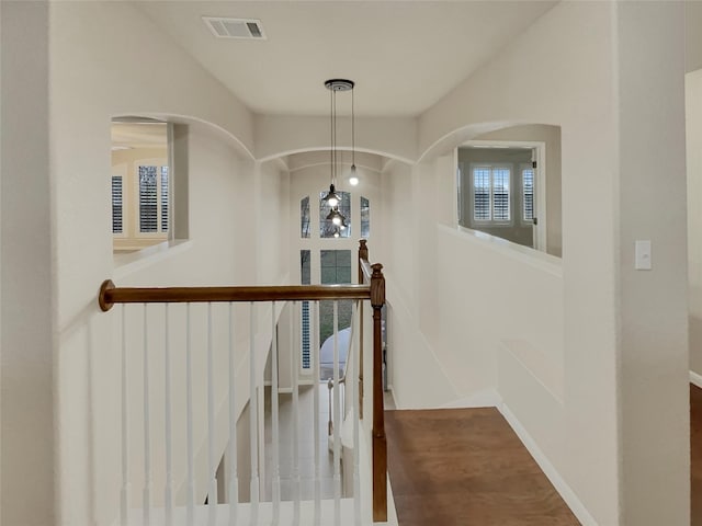 hallway featuring plenty of natural light