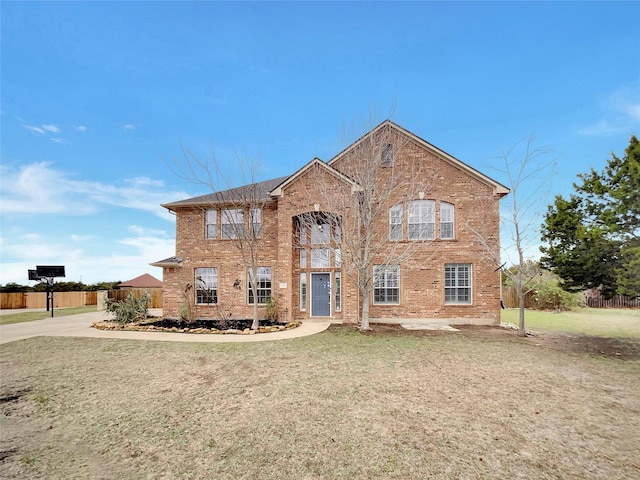 view of property with a front lawn