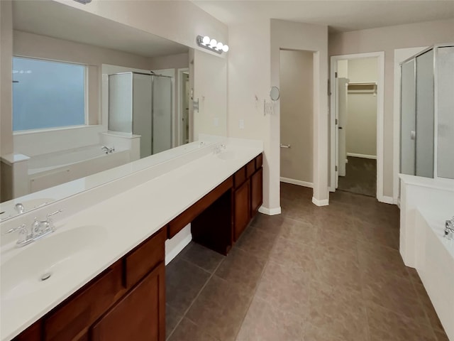 bathroom featuring vanity and plus walk in shower