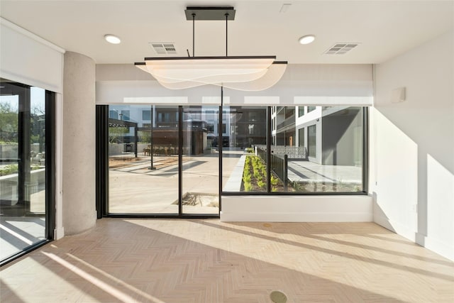 building lobby featuring visible vents