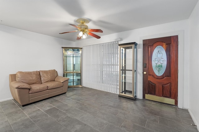 foyer featuring ceiling fan