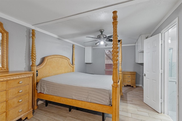 bedroom featuring light hardwood / wood-style flooring, ceiling fan, and ornamental molding